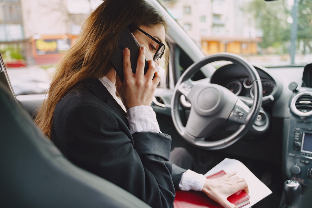 Driver reviewing a penalty notice, example for appealing traffic and parking fines